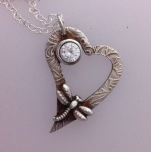 Example of a solid silver necklace with a crystal stone set and dragonfly embellishment added as part of the silver clay cpurses at www.lrsilverjewellery.co.uk