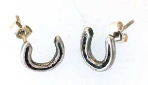 Solid silver horseshoe earrings on sterling silver stud posts handmade by www.lrsilverjewellery.co.uk