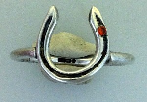 solid silver horseshoe ring on sterling silver band with stone in stud hole handmade at www.lrsilverjewellery.co.uk