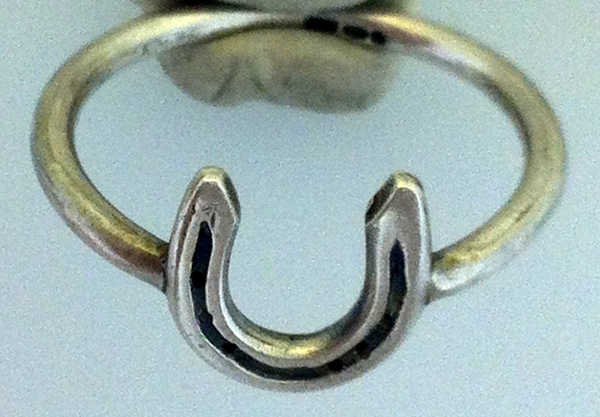 solid silver horseshoe ring on sterling silver ring band, handmade at www.lrsilverjewellery.co.uk