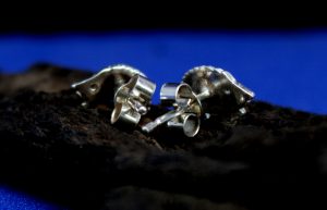 The back of two sterling silver hedgehog studs