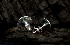 The back of two sterling silver ladybird studs