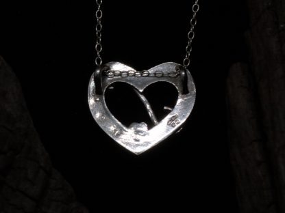 The back of a sterling silver heart necklace